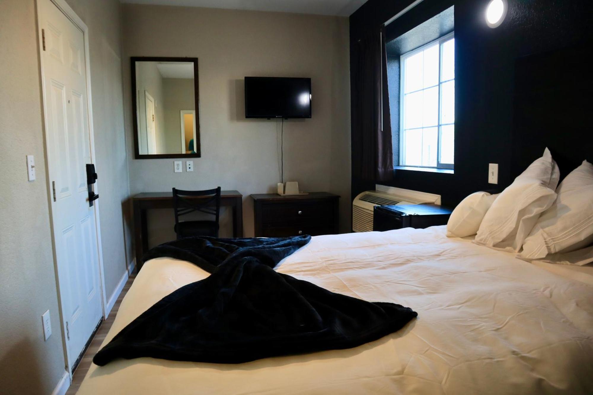 Hotel Dilley Grand Стая снимка